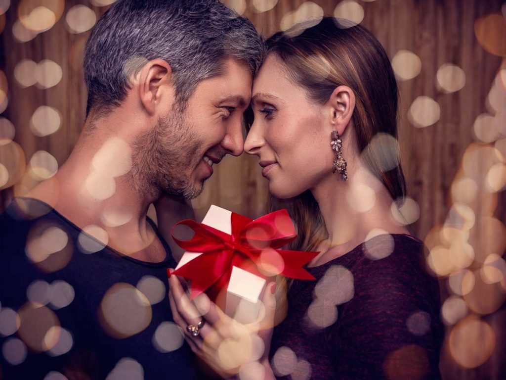 Couple at Christmas party at L'Auberge Del Mar