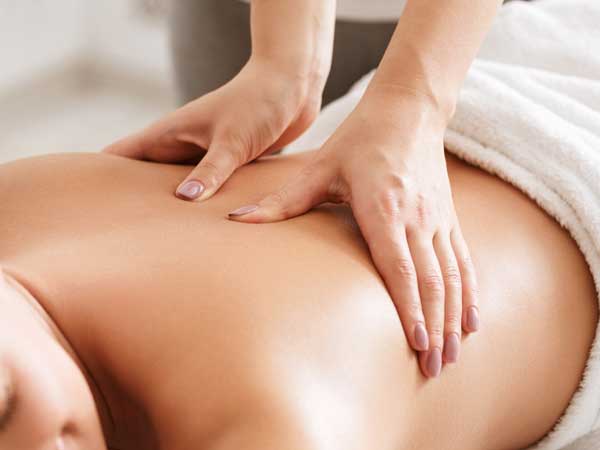 woman getting a back massage