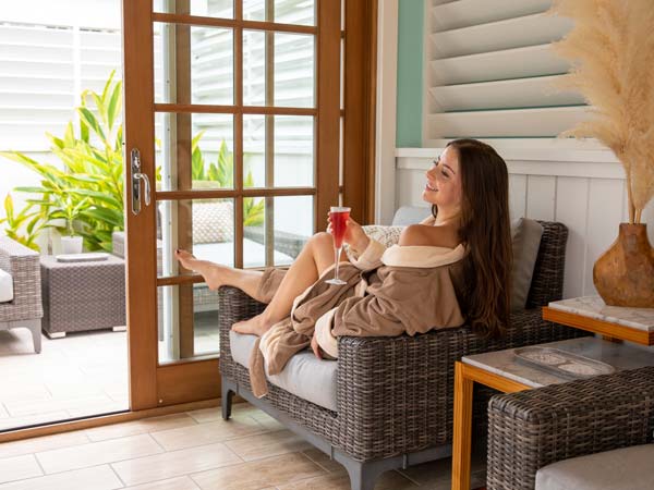 Lady Having A Drink At The Spa.